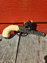 Flintlock Pocket Pistol with Scroll Design