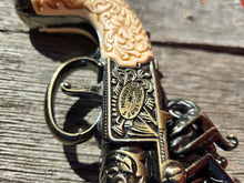Flintlock Pocket Pistol with Scroll Design