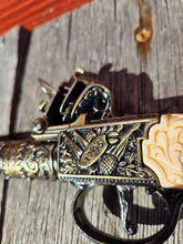 Flintlock Pocket Pistol with Scroll Design